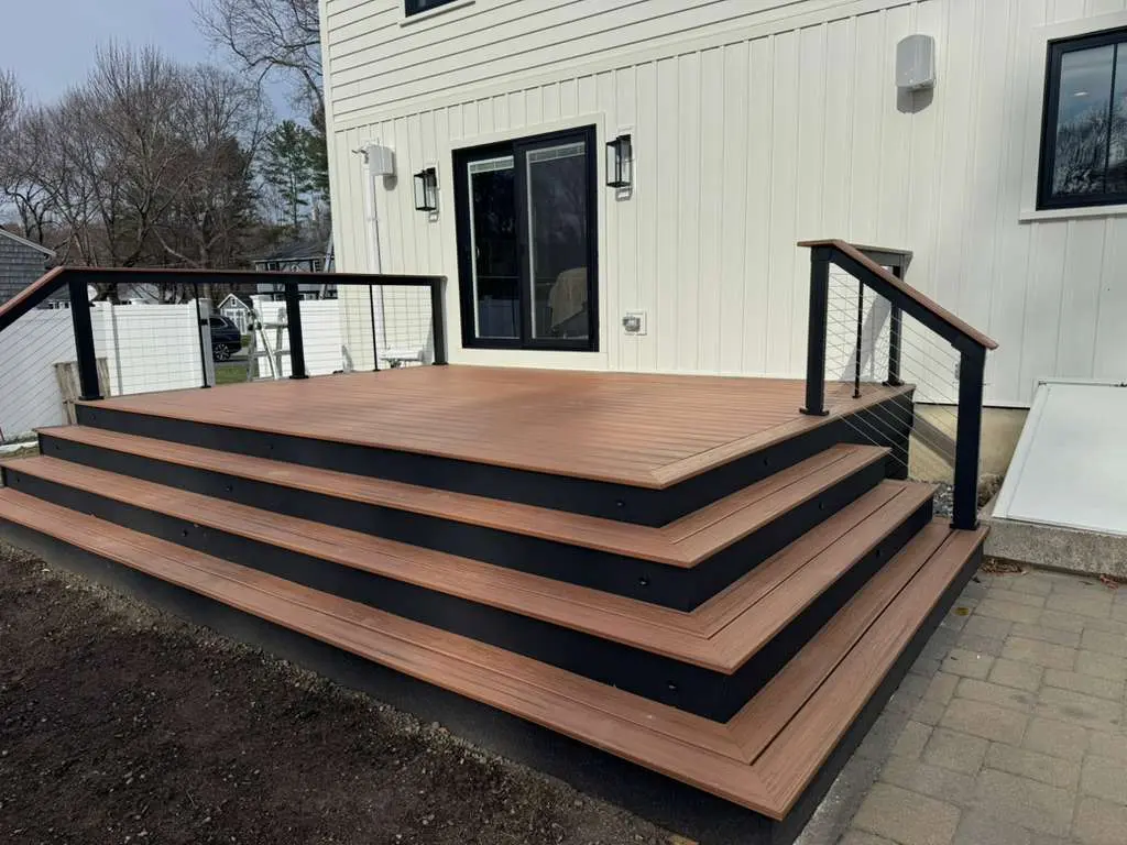Finished composite deck with cable railing