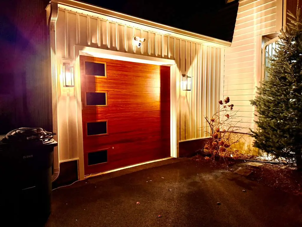 Modern entry door installed by Italian Construction